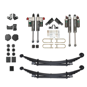 Complete Falcon Performance suspension lift kit with shocks, springs, brackets, and hardware laid out and ready for installation. 

